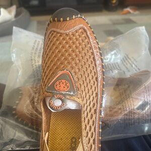 Brand new pair of men’s slip on shoes